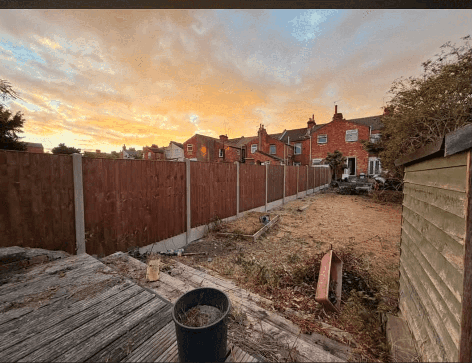 New closeboard fence panels installed along the boundary with the garden cleared