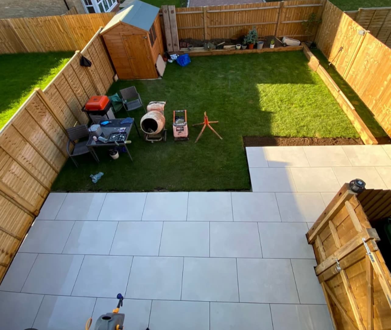 Quality timber fencing around a garden with fresh lawn